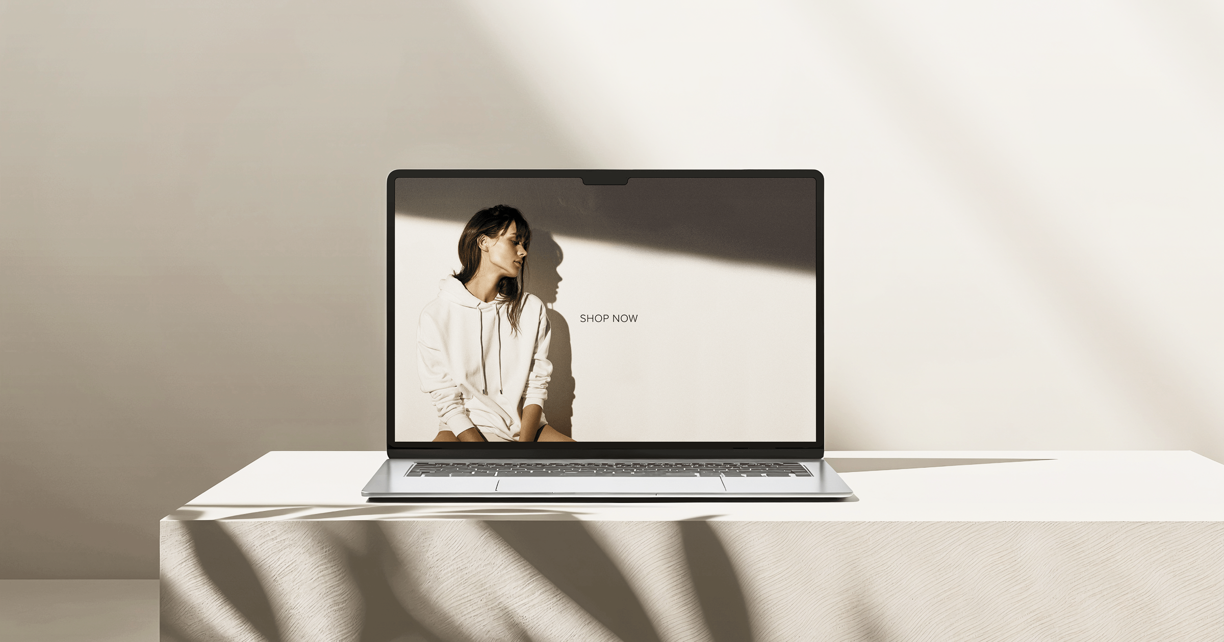 Online fashion shop on a laptop.